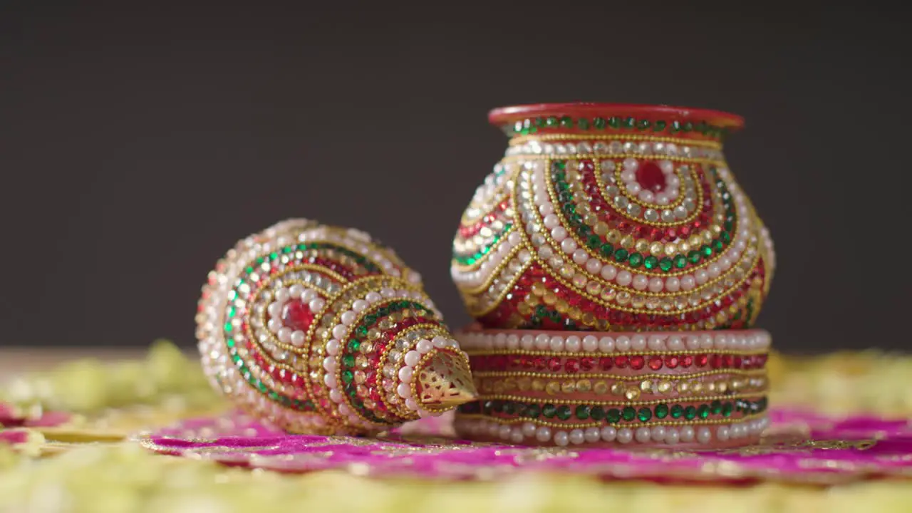 Traditional Coconut Pots On Table Decorated For Celebrating Festival Of Diwali 3