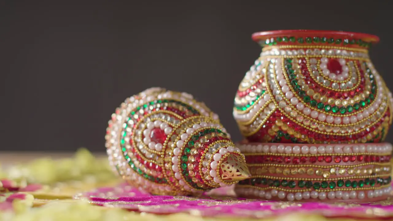 Traditional Coconut Pots On Table Decorated For Celebrating Festival Of Diwali 2