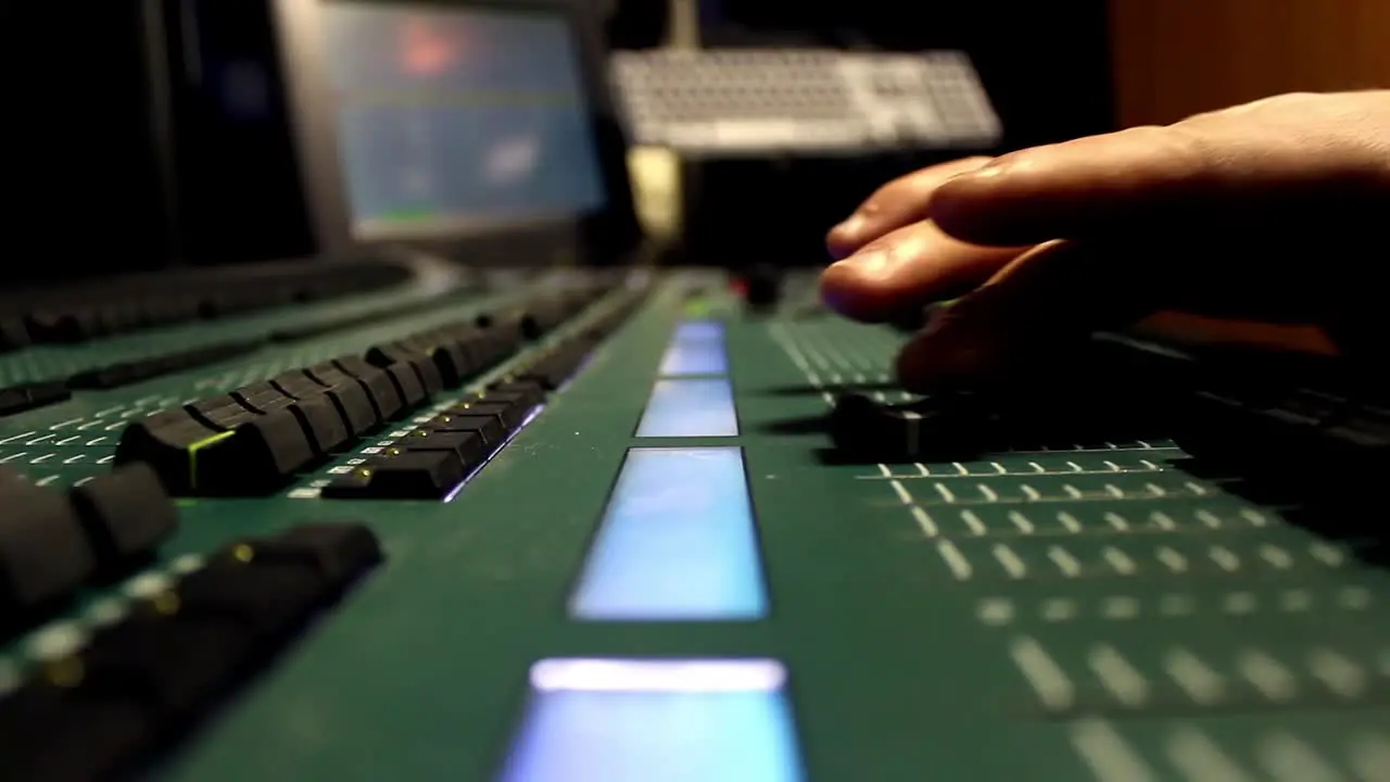 Male Hands Using Sound And Light Digital Mixer At A Concert 2