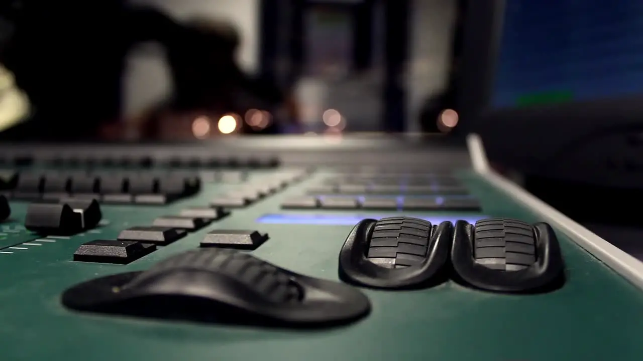 Male Hands Using Sound And Light Digital Mixer At A Concert 1