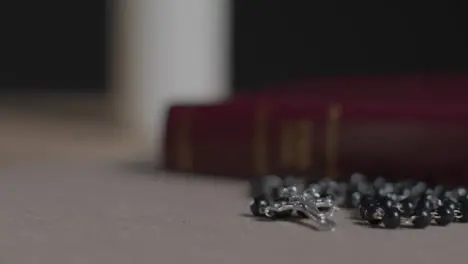 Tracking Shot of Bible and Crucifix