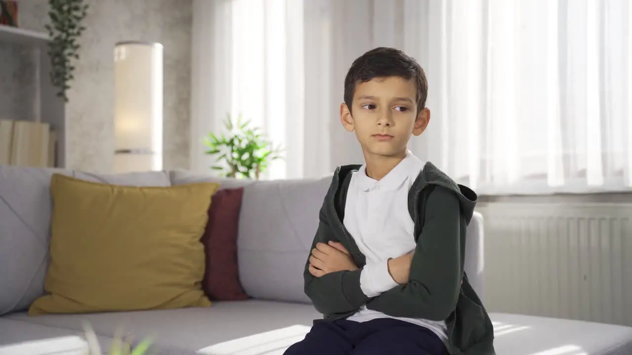 Thoughtful boy at home