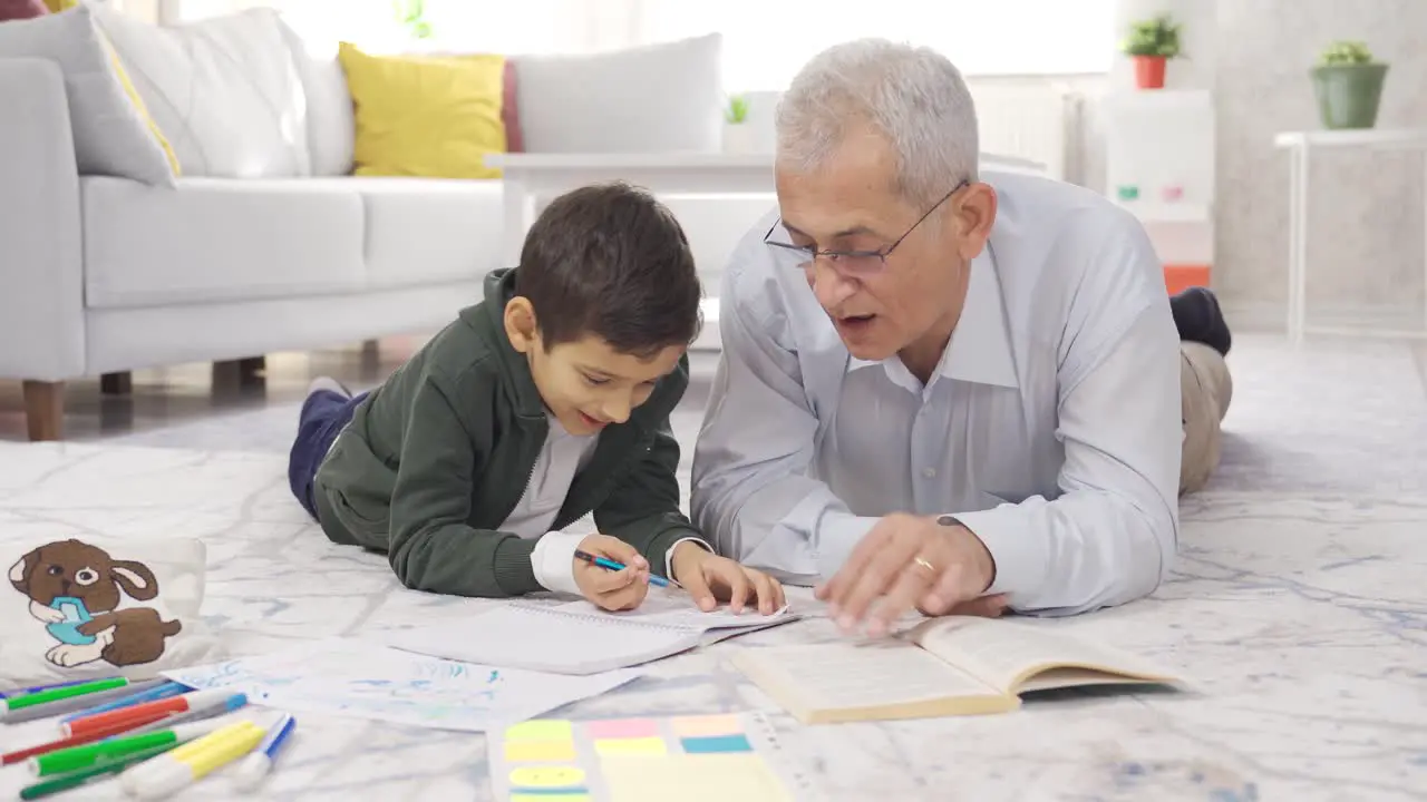 Father helping his student son with homework