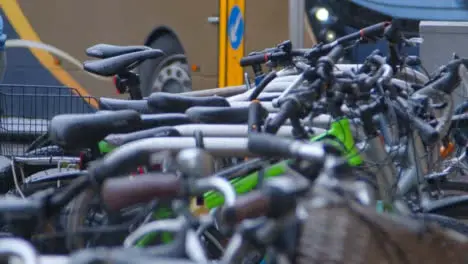 Sliding Shot Revealing Public Bicycle Rack In Rain