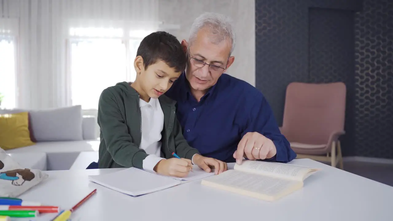 Father helping his son with homework