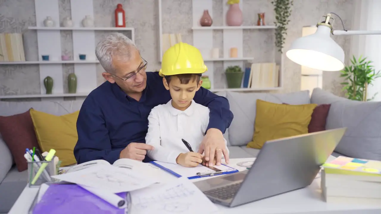 The man who works from home and his curious and intelligent son