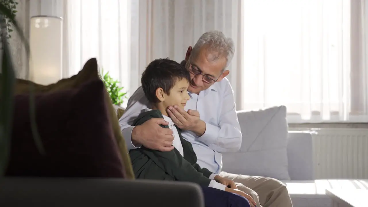 The father tells his son and makes him emotional