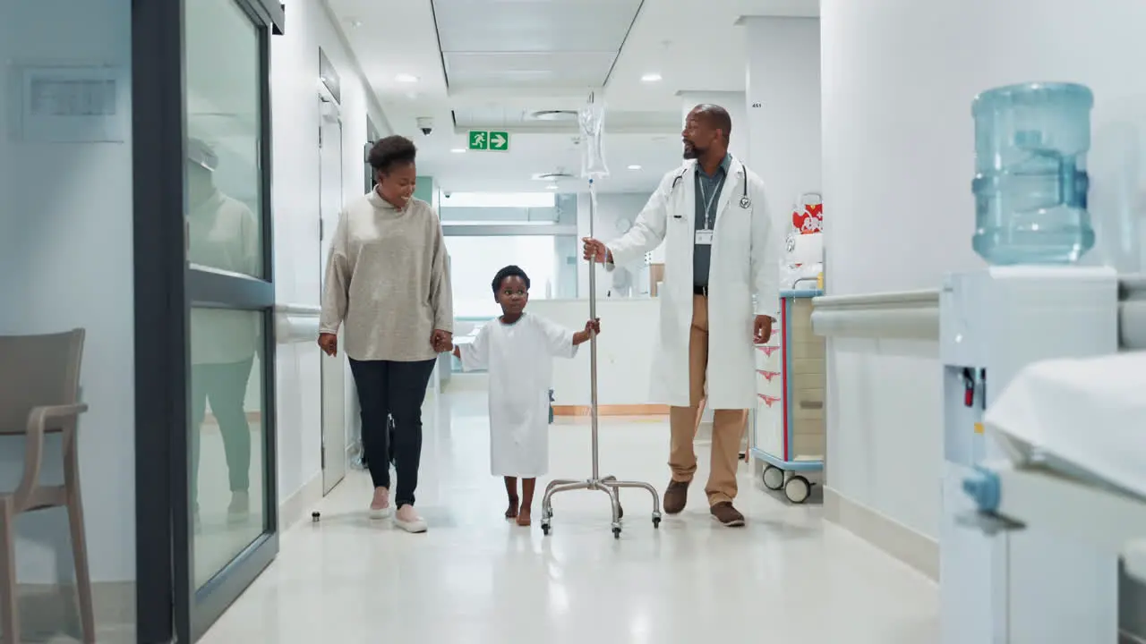 Healthcare pediatrician and a doctor walking