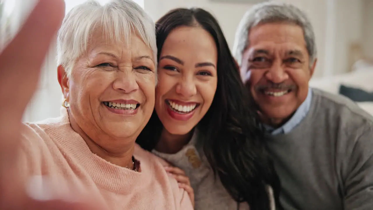 Family selfie woman and senior parents