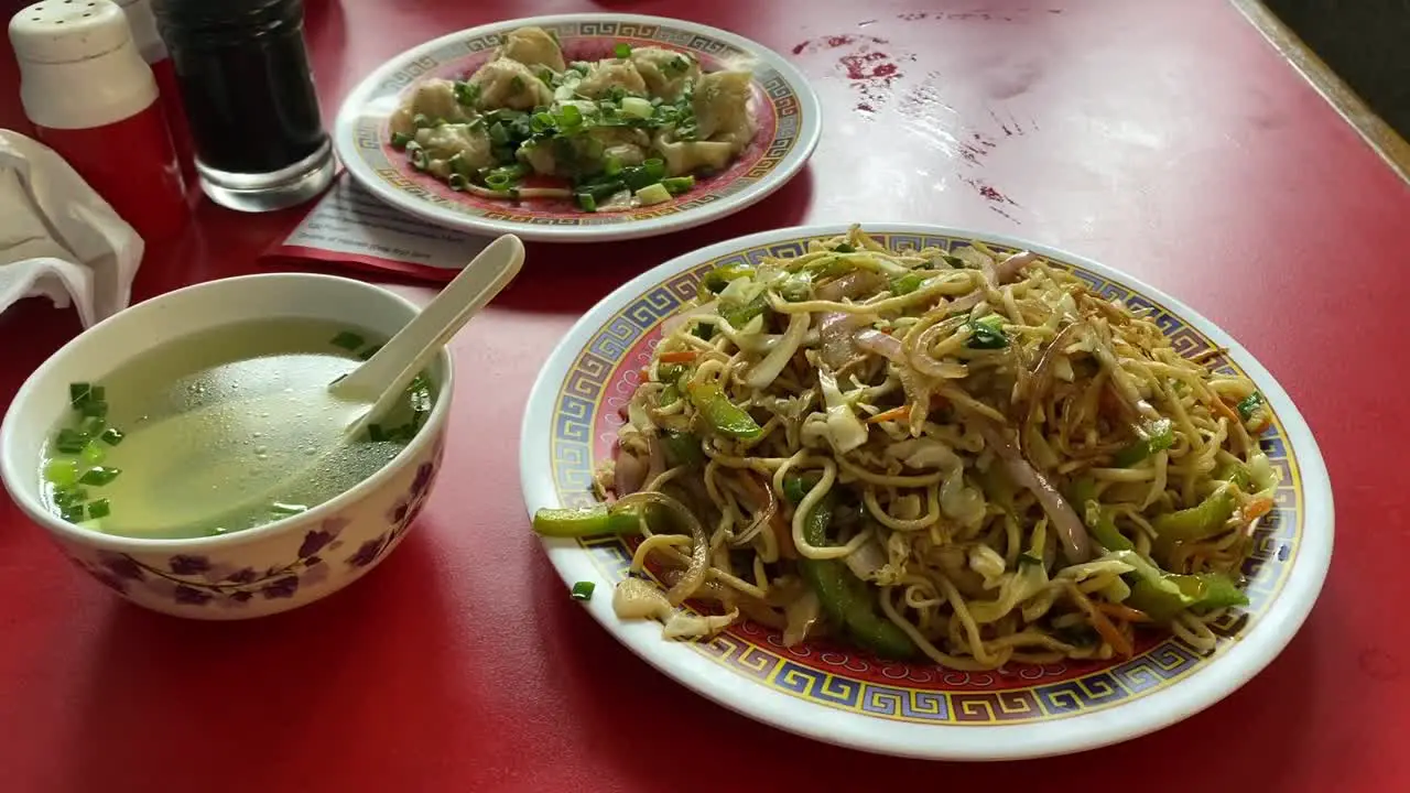 Close up shot of tasty Tibetan dishes on a table inside a restaurant in Kolkata India