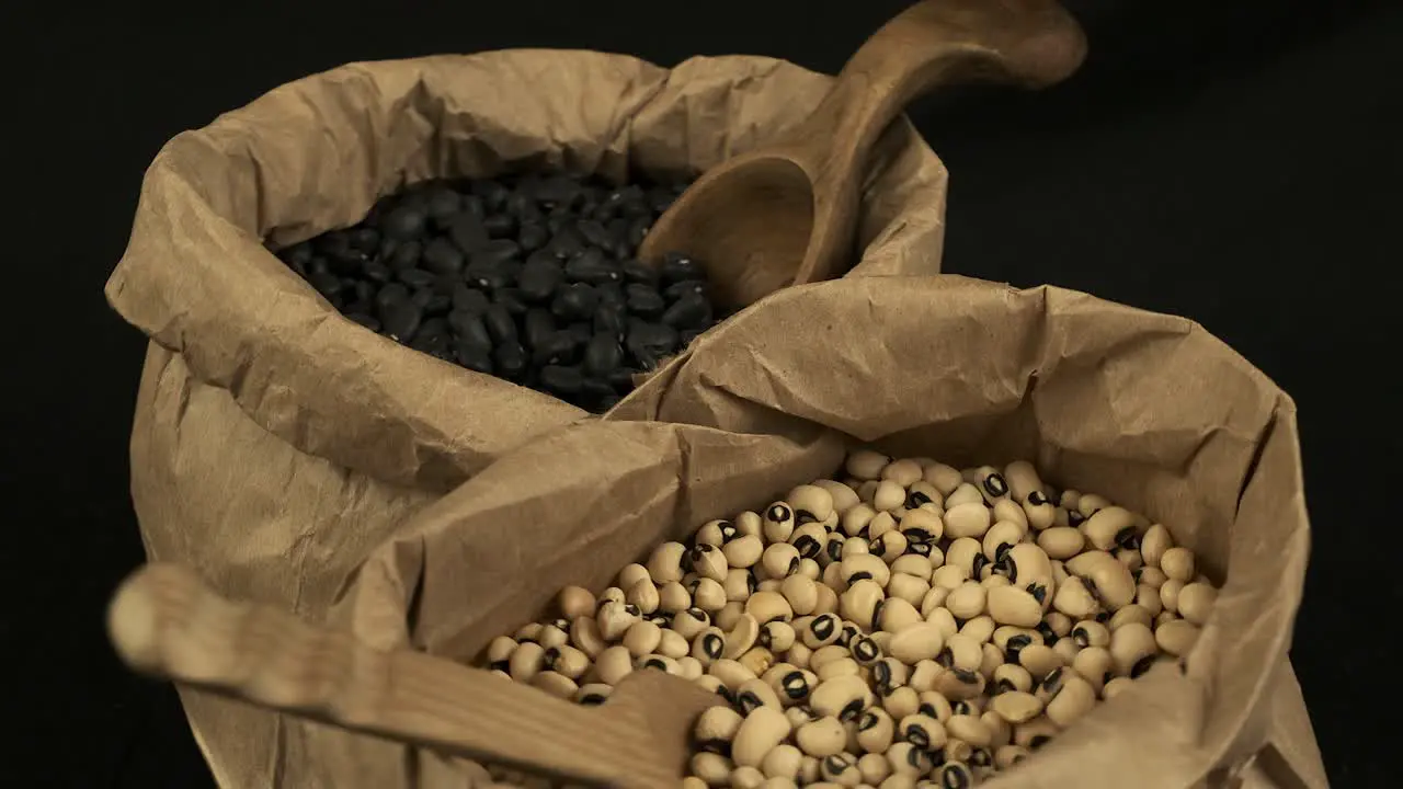 Two bags of dry beans black turtle beans and black-eyed peas rotate