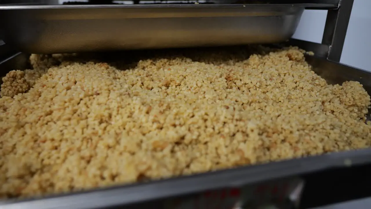 Close up shot of finished food on shelves ready to serve in a food factory