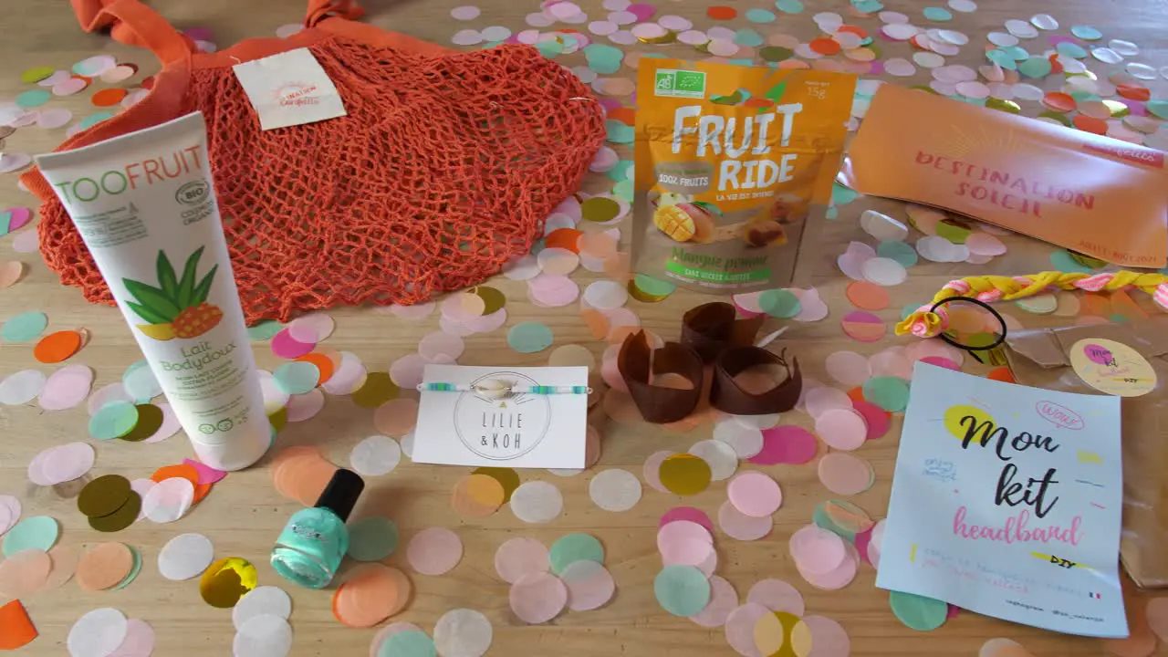 Dolly shot of a collection of items surrounded by decorative paper circles