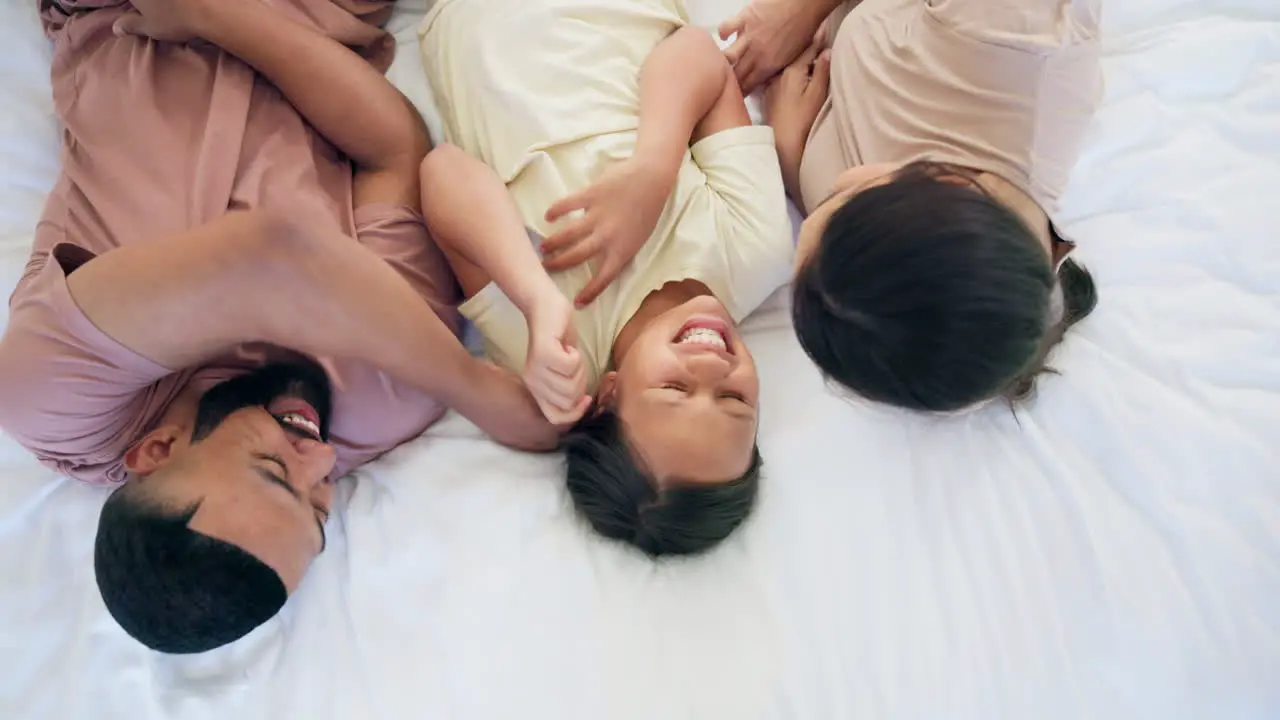 Happy family child and tickle in bedroom