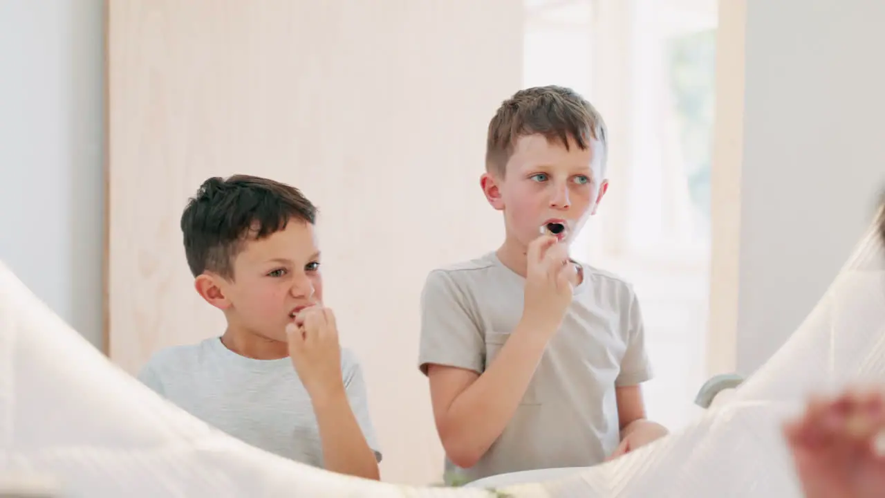 Morning bathroom and children brushing teeth