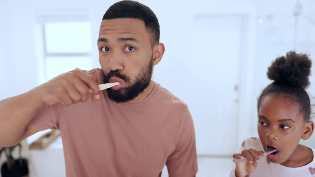 Father child and brushing teeth for dental