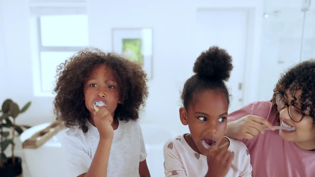 Mother children and brushing teeth for dental