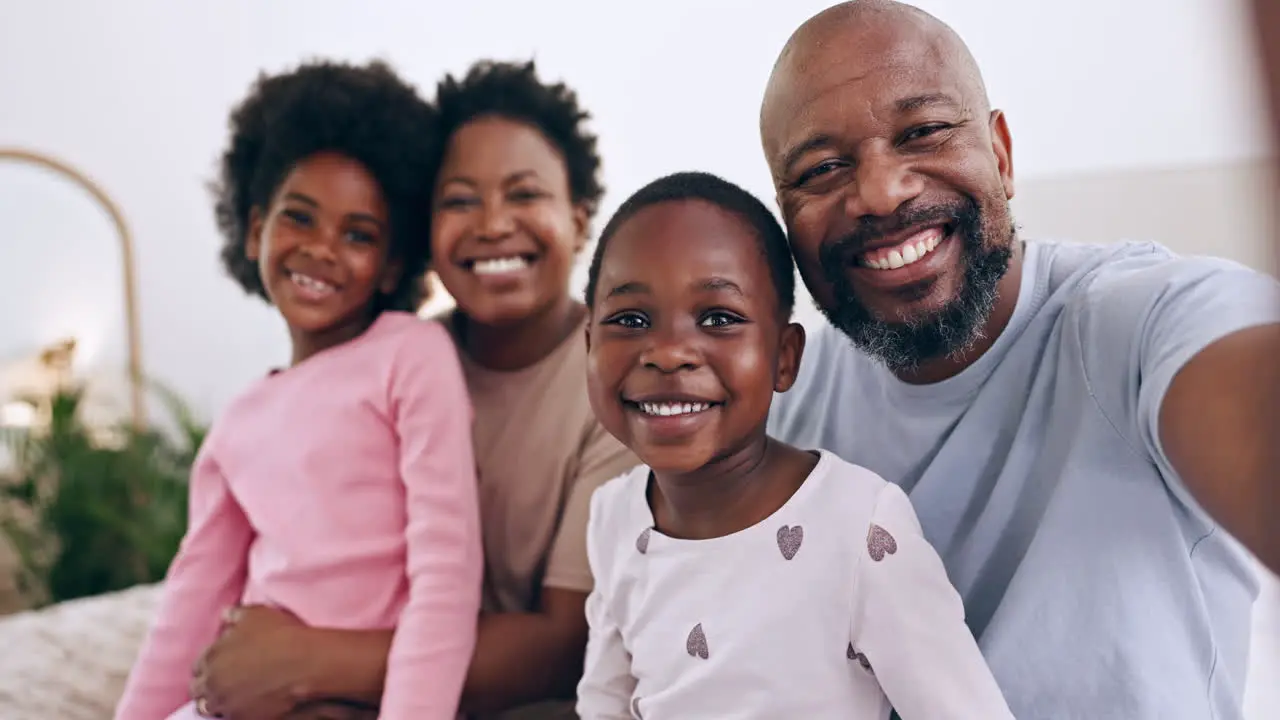 Happy selfie and black family bonding in bed