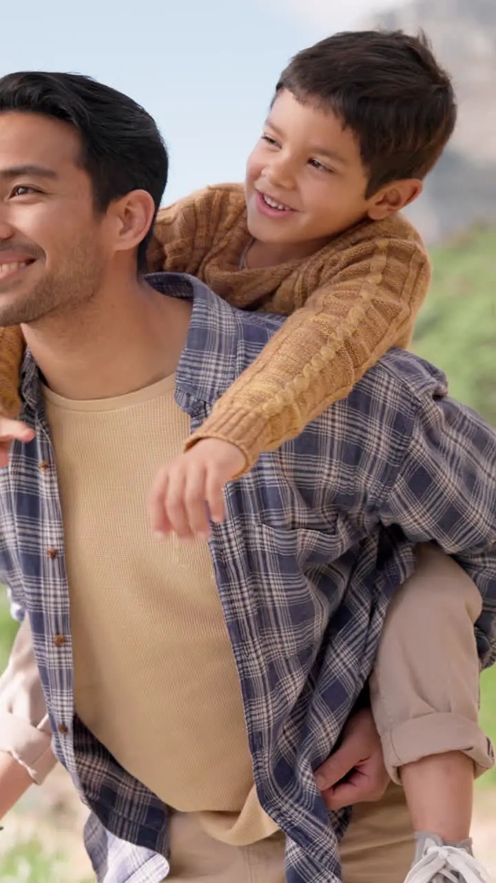 Happy family piggyback and father with boy child