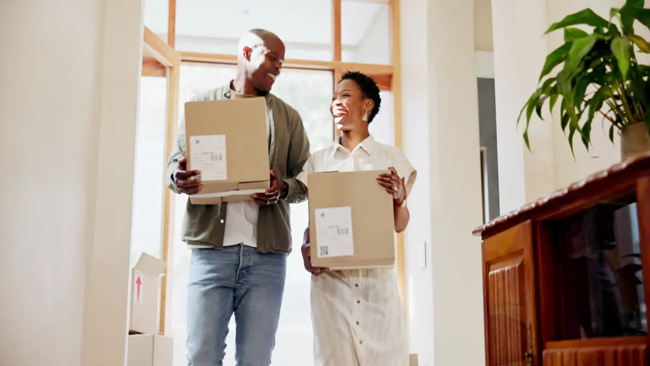 Happy black family box and moving in new home