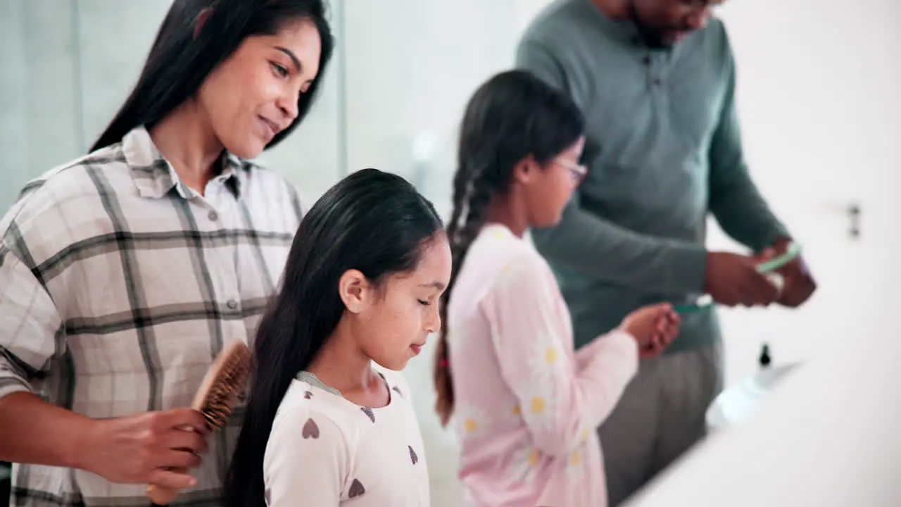 Parents girl kids and bathroom for brushing hair