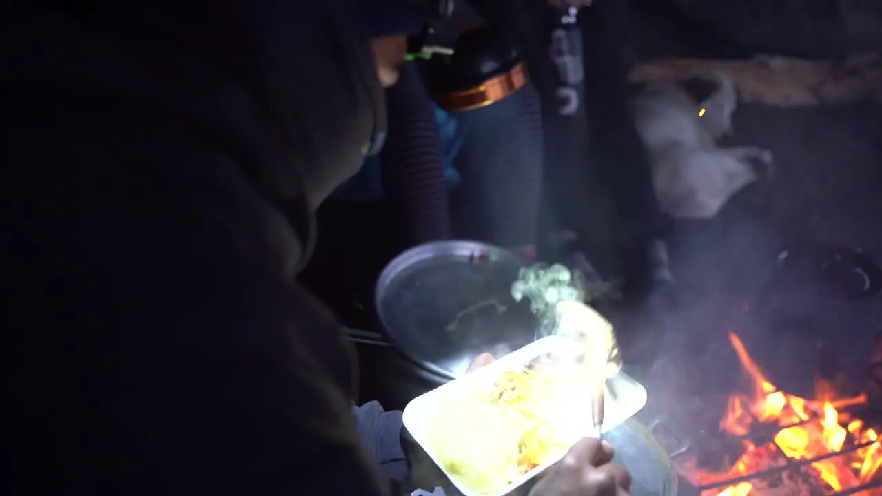 Making food in the cold weather on top of the Acatenango Volcano