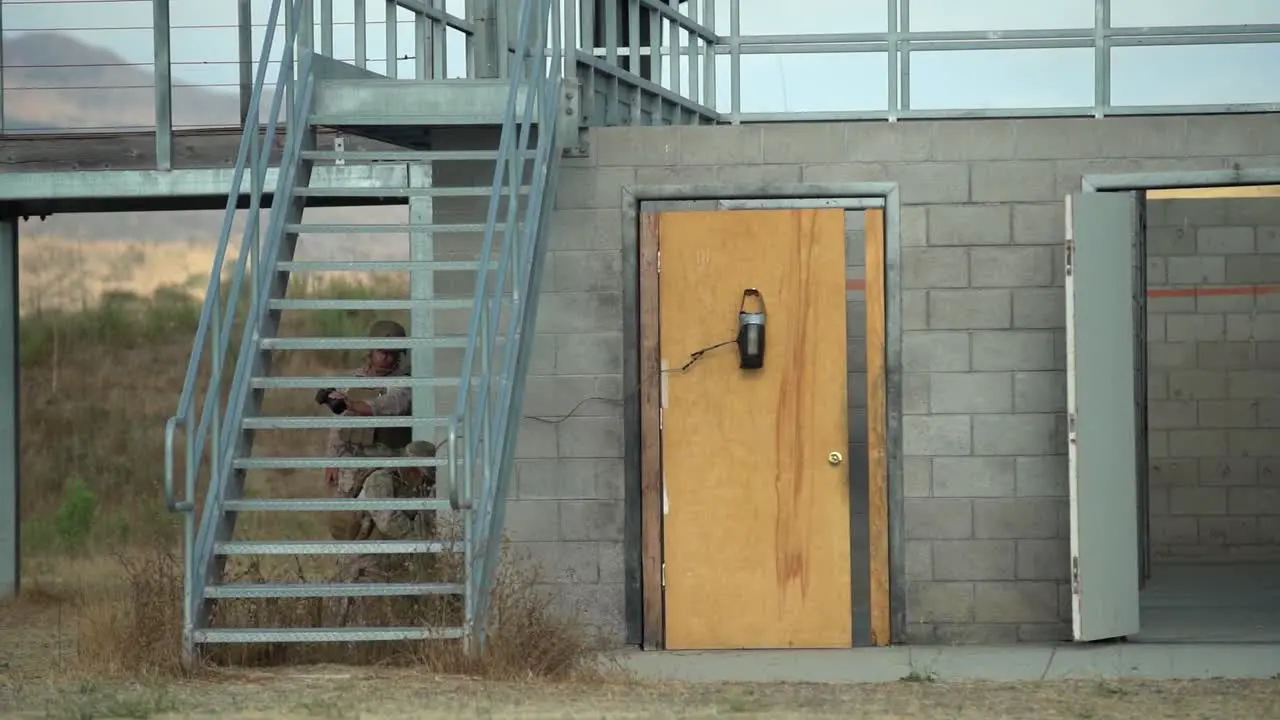 Combat Engineers Breach A Door Using Small Explosives Before Entering A Block Building During Training Camp Pendleton