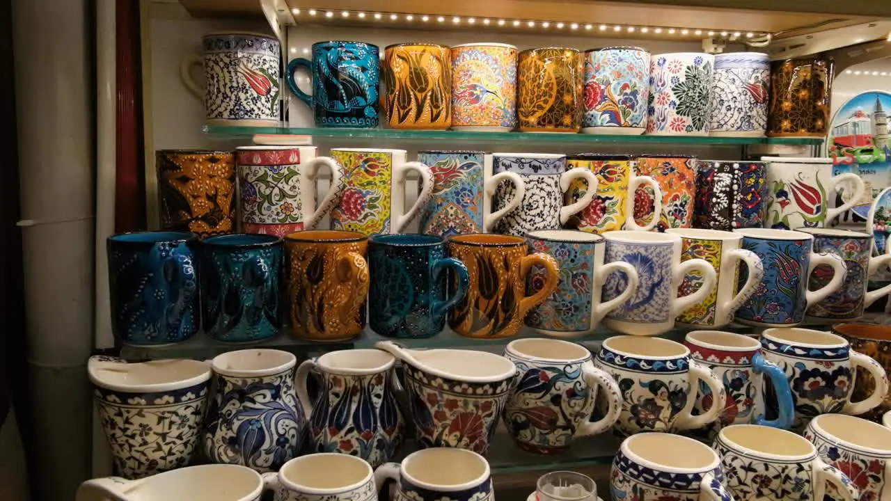 Tracking Shot of Colourful Mugs