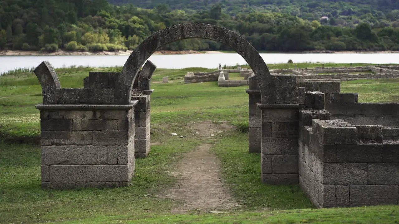 Wide shot of arche of the entrance of Aquis Querquennis an Arqueologic complex former Roman military camp in Bande Ourense Spain