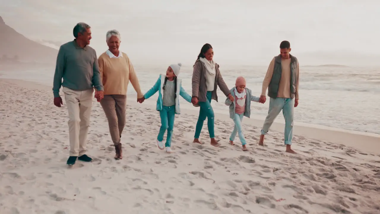 Holding hands big family and beach walk in nature