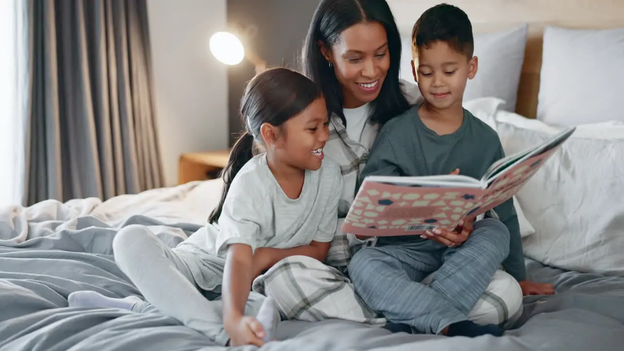 Mom children and book for reading on bed