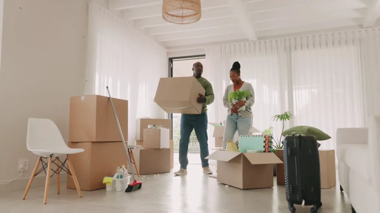 Father mother or children in new house with boxes