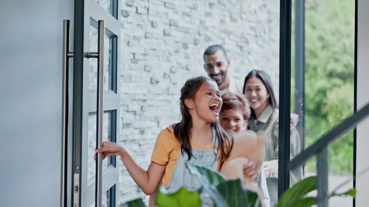 Happy family front door and moving in new home