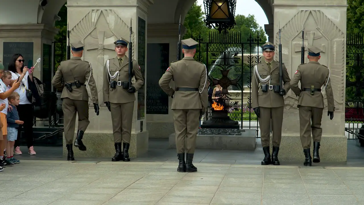 Guards in traditional uniforms at the solemn Tomb of the Unknown Soldier in Warsaw Poland