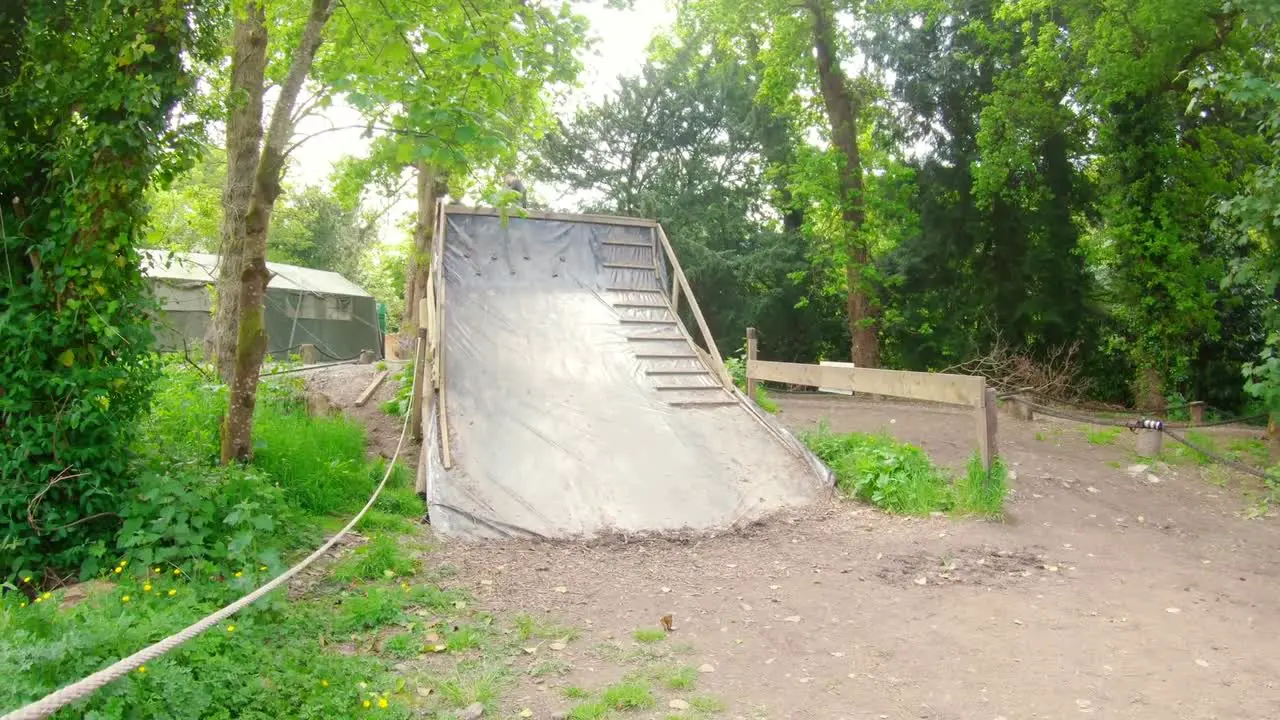  Fit men training over obstacle course 4k