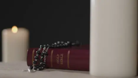 Close Up Shot of Bible and Crucifix