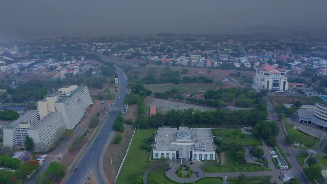 Shehu Musa Yar' Adua Centre in Abuja Nigeria descending aerial view on a smoggy day