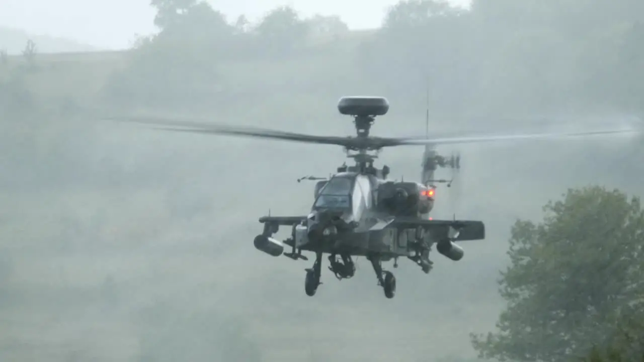 Us Army Ah64 Apache Attack Helicopter Lands In Downpour Nato Combined Resolve Exercise In Germany