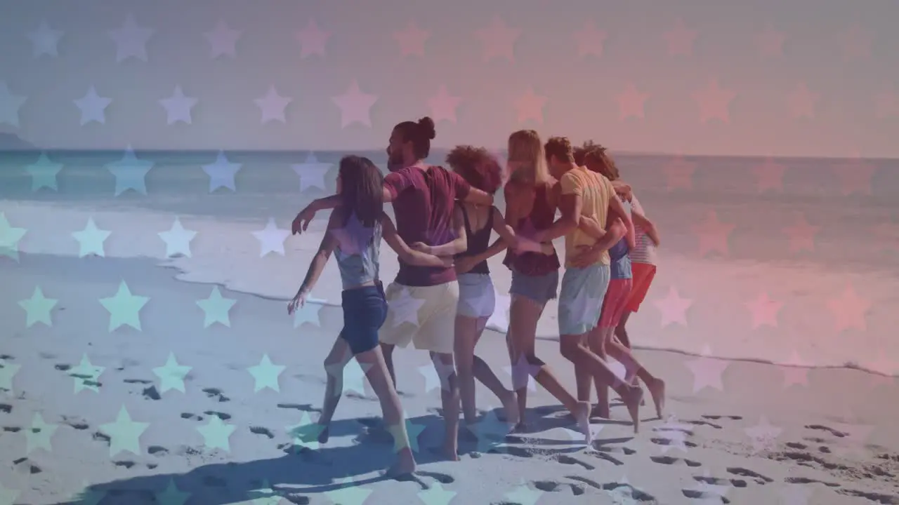 Multiple blinking stars against group of friends walking together on the beach