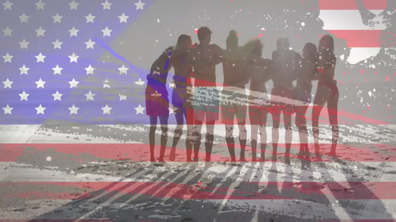 American flag with glitch effect against group of friends standing together at the beach