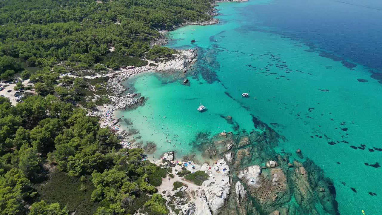 Beach Kavourotrypes and Clear Blue Sea Coastline in Halkidiki Greece Aerial 4k