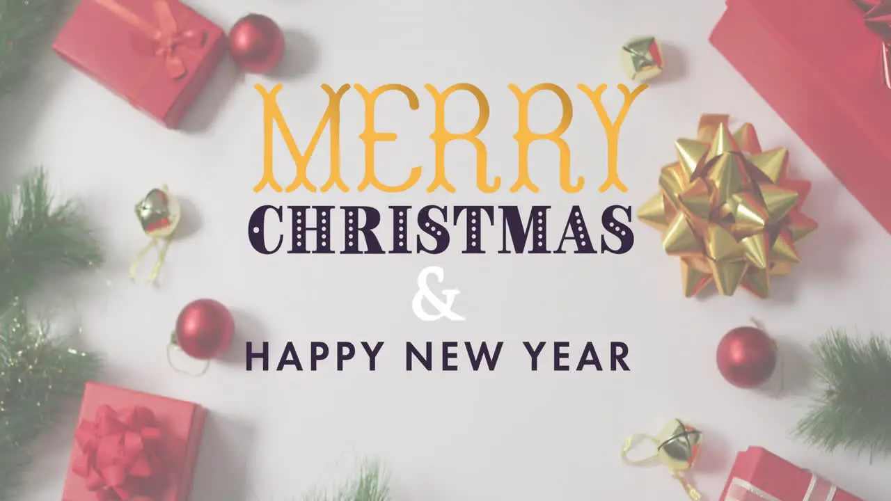 Animation of merry christmas and happy new year text over christmas decorations and gifts on table