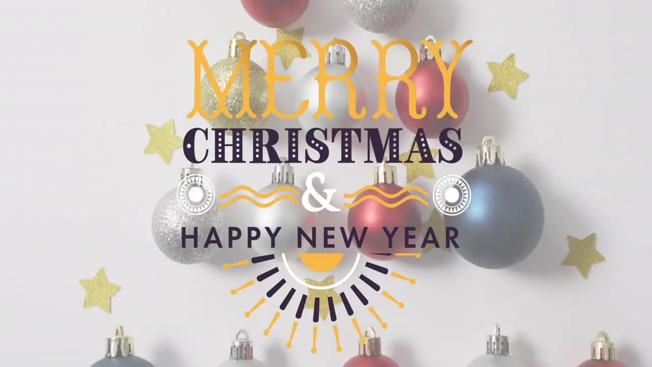 Animation of merry christmas and happy new year text with christmas decorations on table