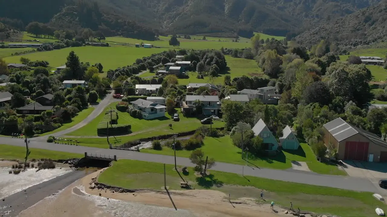 Aerial shot of Anakiwa town by beach Queen Charlotte Sound Marlborough Sounds South Island New Zeland