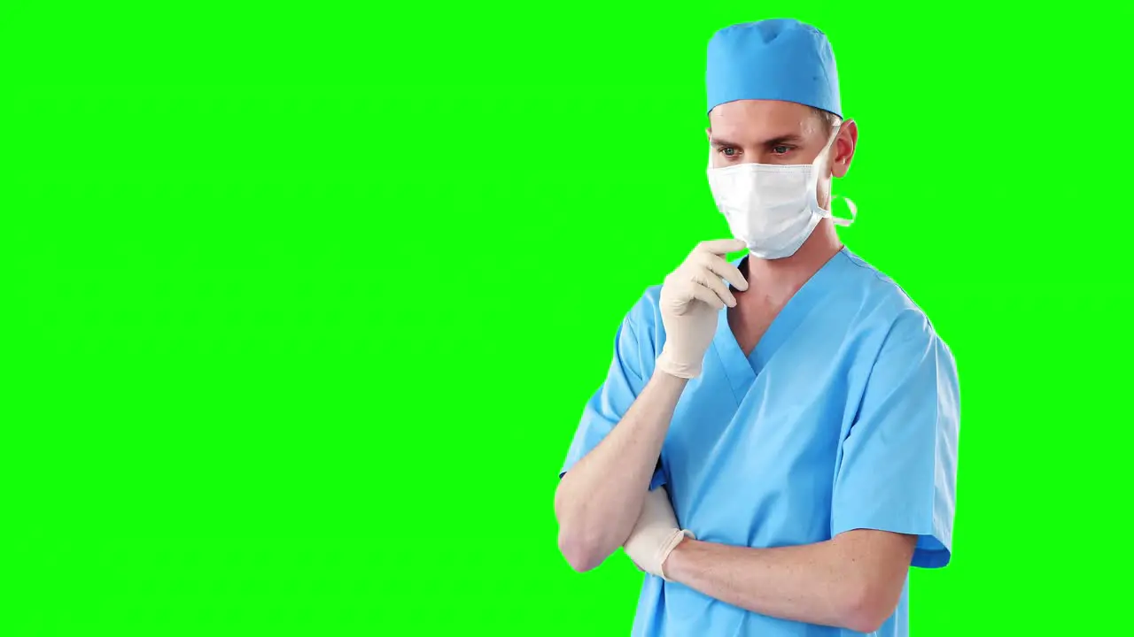 Male surgeon using digital screen