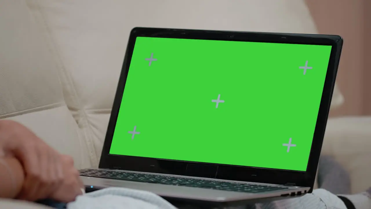 Close up of horizontal green screen on laptop