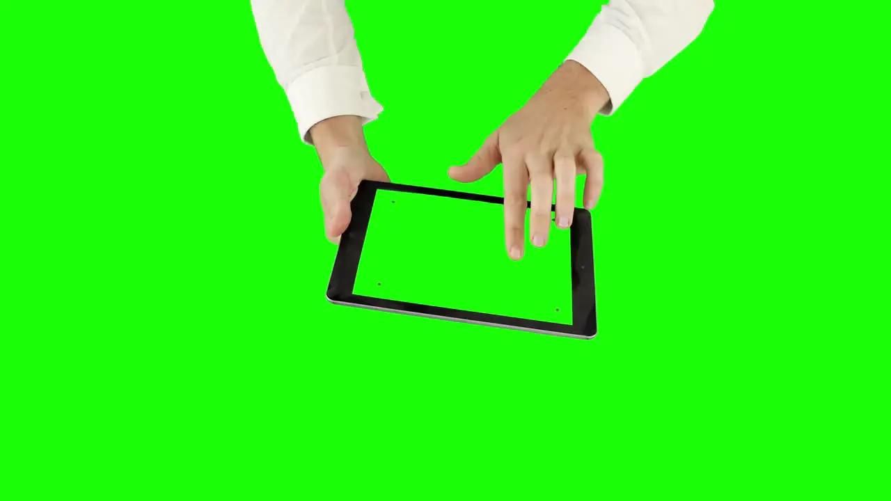 Overview of a businessman using a tablet