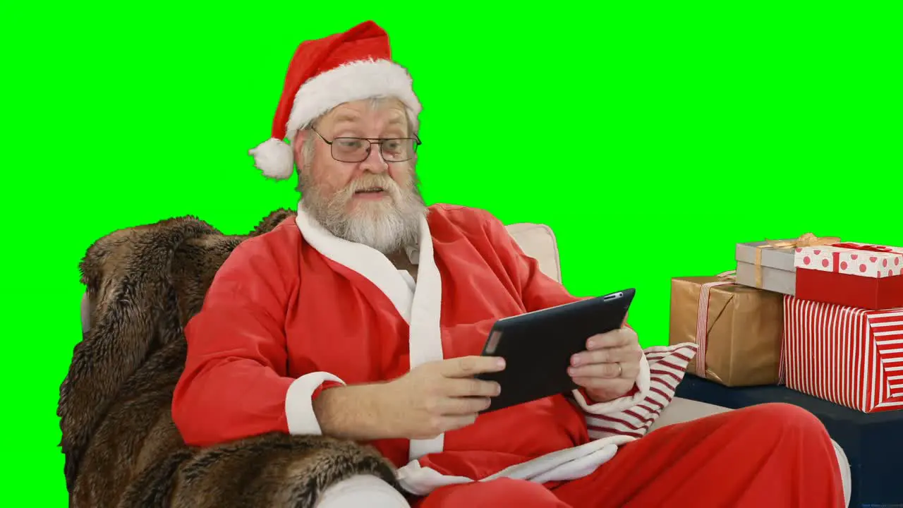 Santa claus using digital tablet