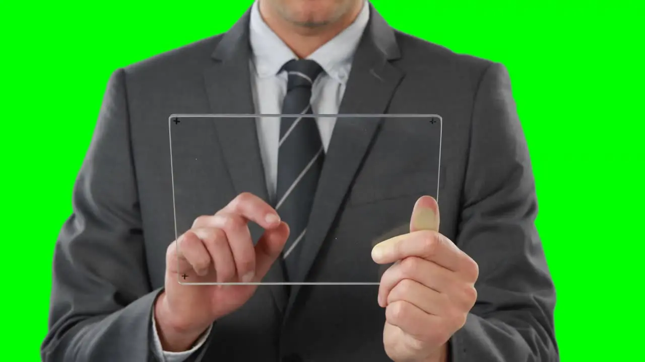 Businessman pretending to use digital tablet