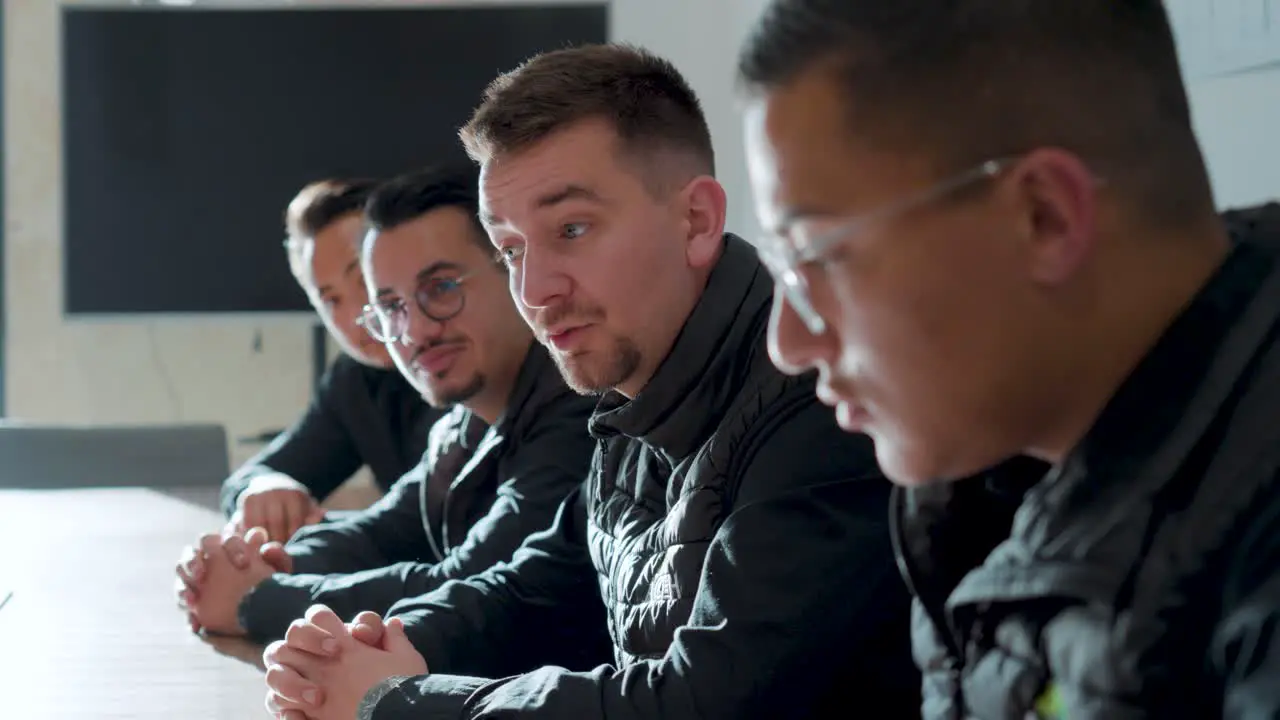 Slow motion shot of businessmen speaking during a business meeting